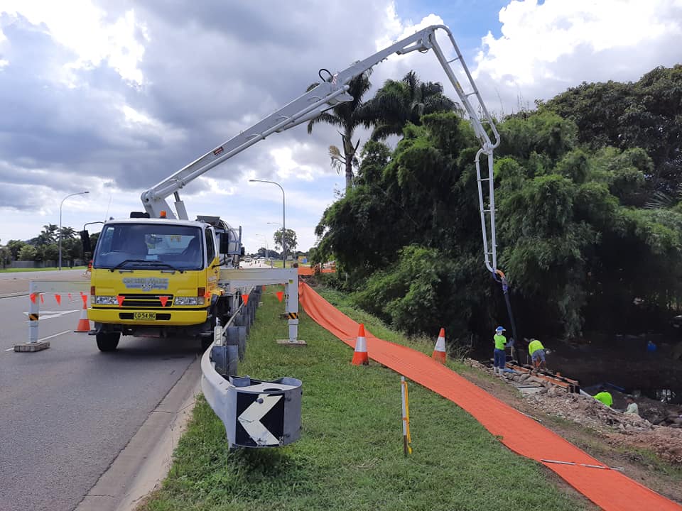 Concrete pumping new sidewalk— Concrete in Townsville, QLD