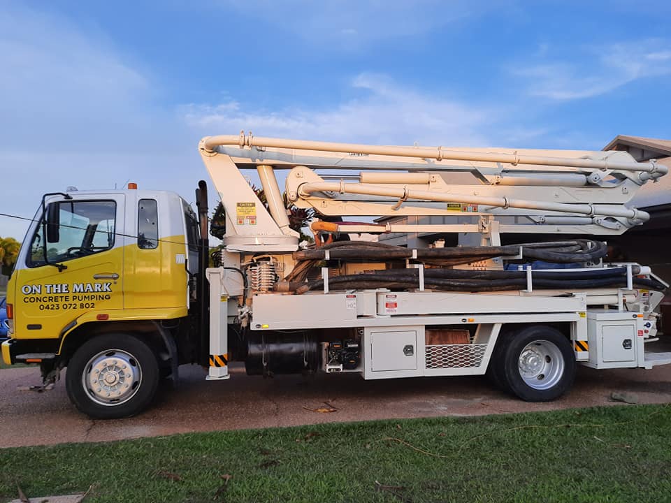 Concrete pumping yellow truck — Gallery in Townsville, QLD