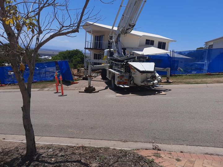 Concrete pump on residential construction site — On The Mark Concrete Pumping in Townsville, QLD