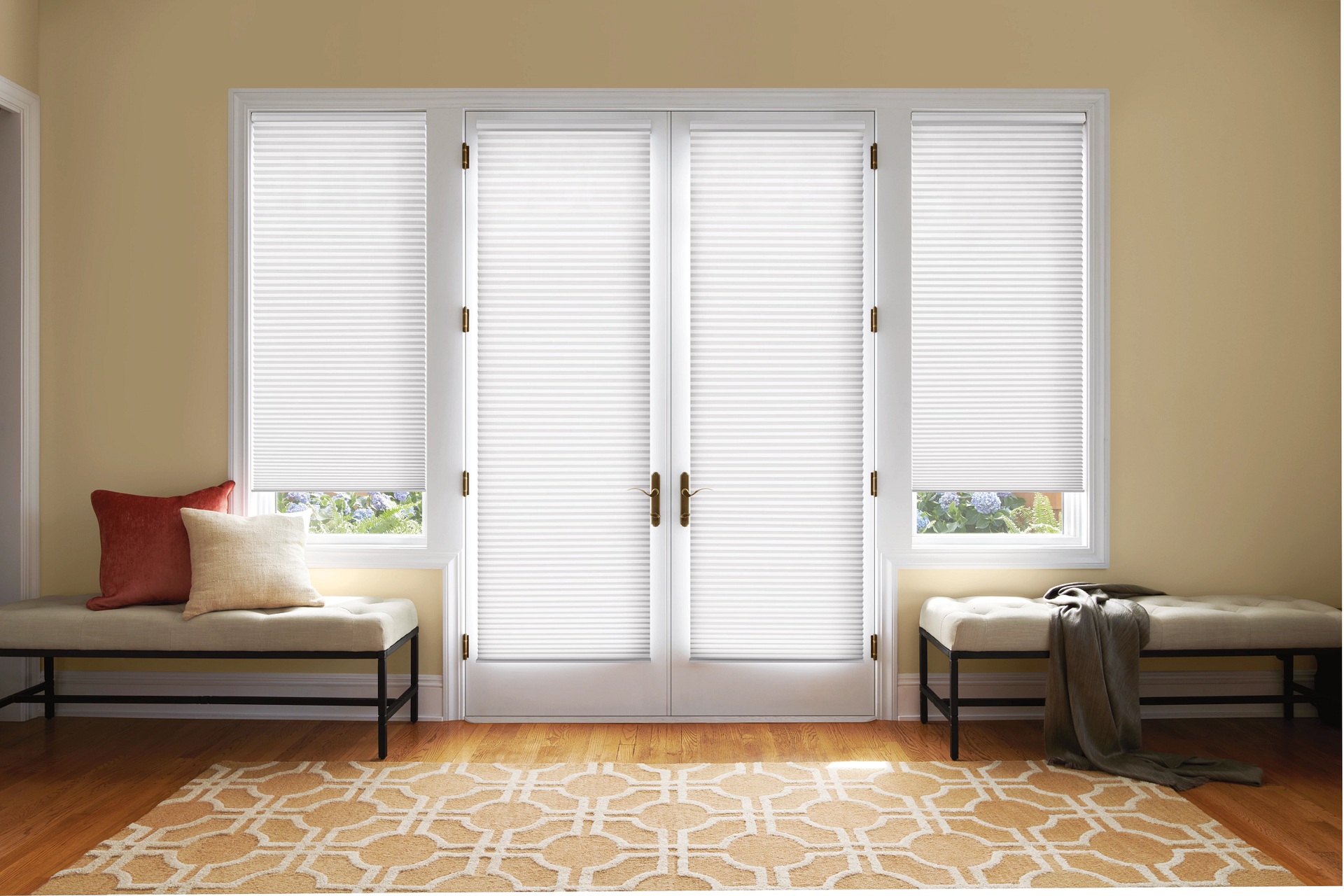 Hunter Douglas French door shades in a living room near Hopkins, MN.