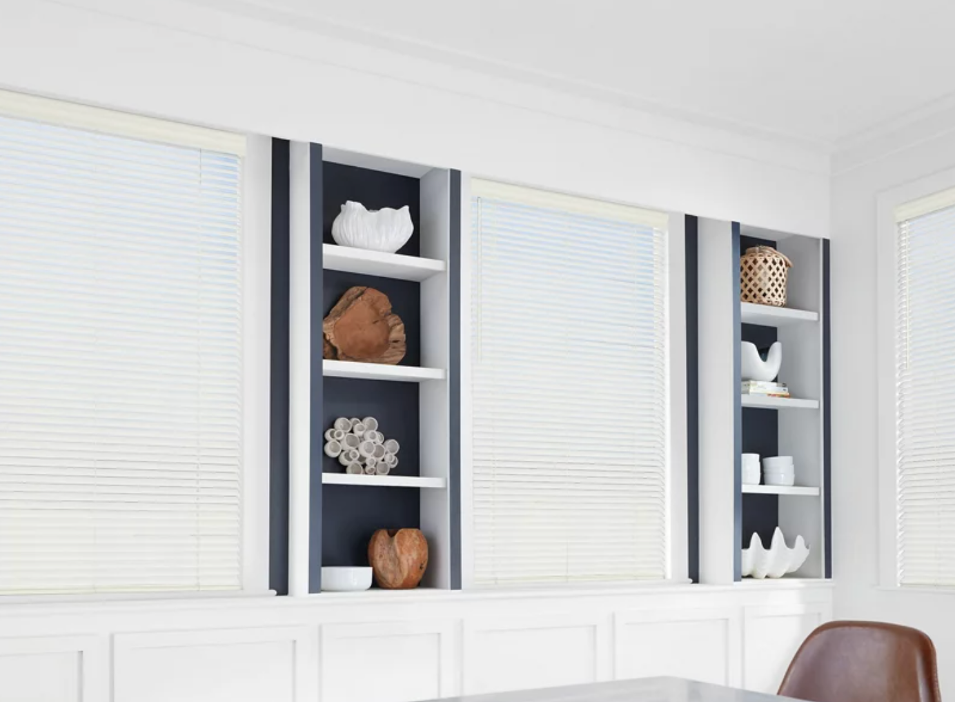 Hunter Douglas wood shutters in a contemporary living room.