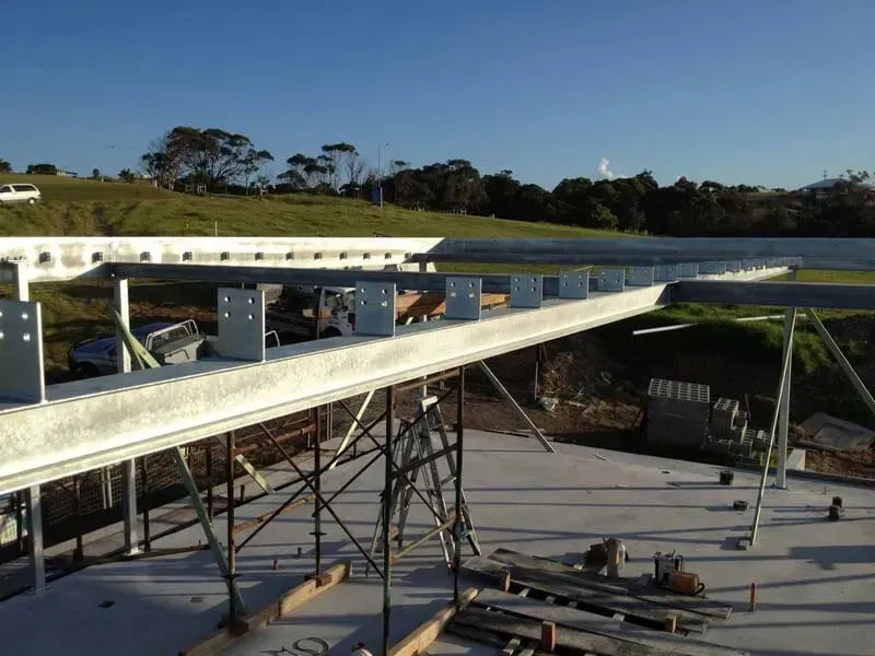 A Building Under Construction With A Blue Sky In The Background — BM Steel Fabrication In Forster, NSW