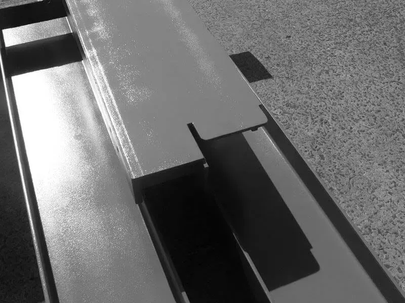 A Black And White Photo Of A Piece Of Metal — BM Steel Fabrication In Forster, NSW