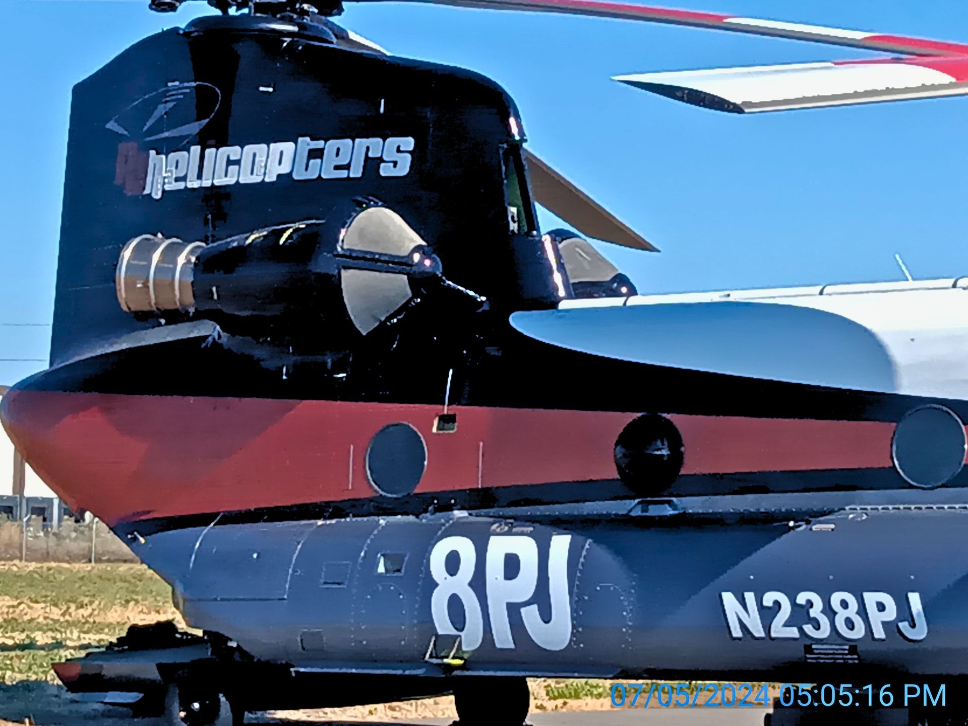 A helicopter with the number 8pj on the side