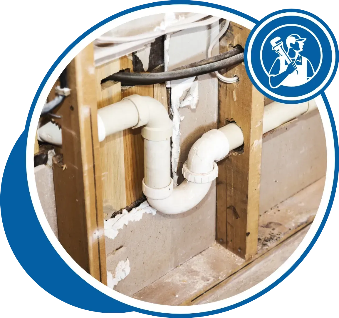 White plumbing trap within a wall cavity. A blue circle with a plumber logo is visible.