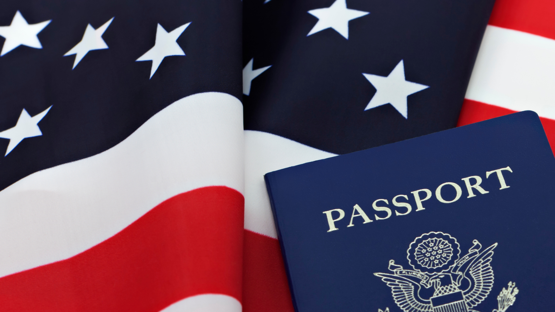 American flag and blue US passport.