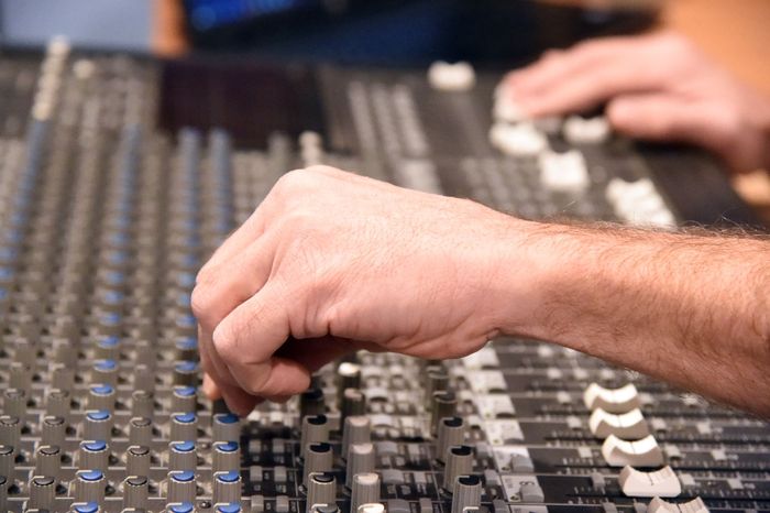 Hand With Sound Recording Studio Mixer - Colorado Springs, CO - Drop D Studios