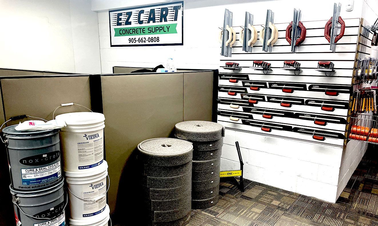 A room with buckets and a sign that says ez cart