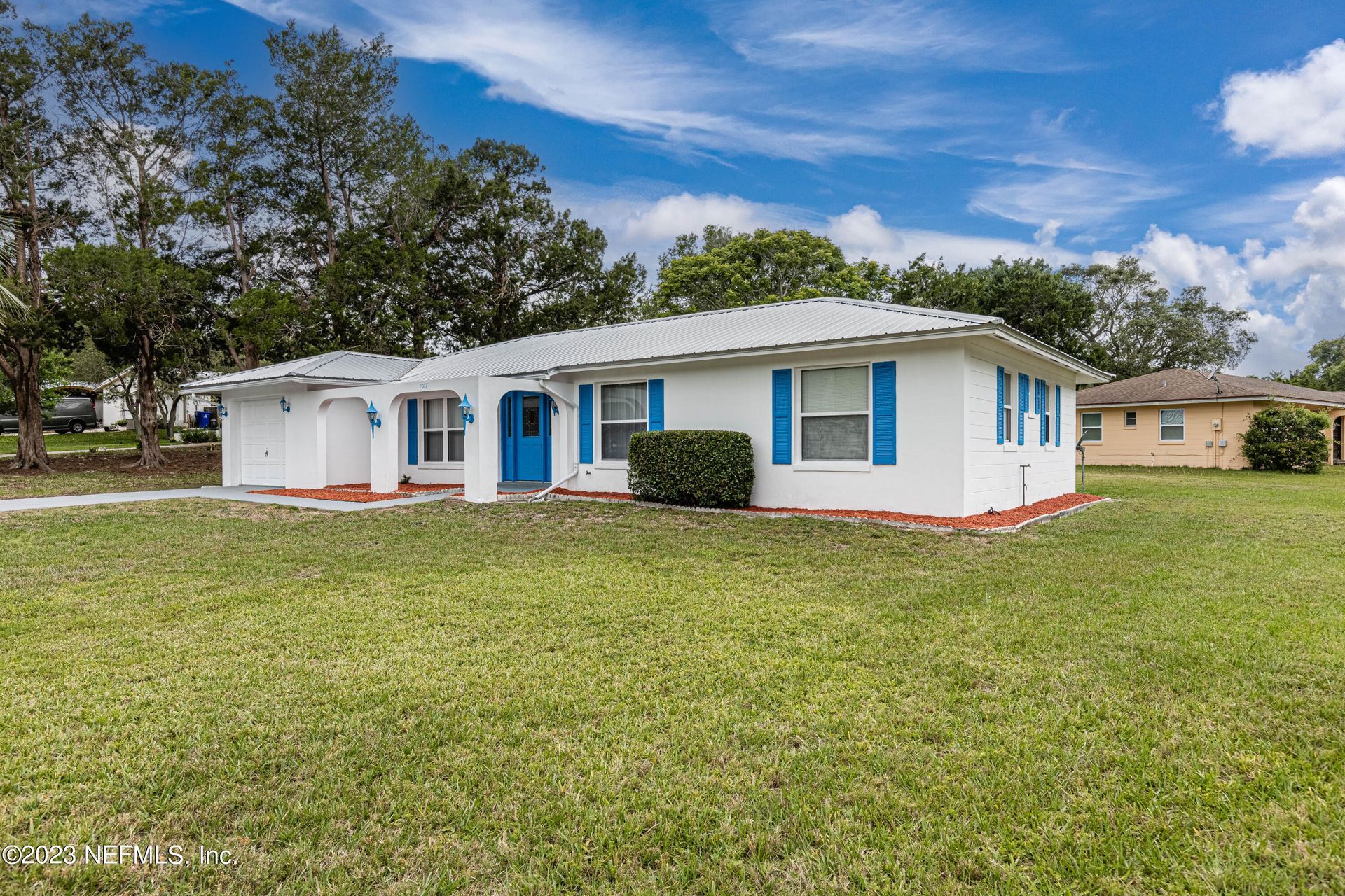 A living room filled with furniture and a fireplace.
