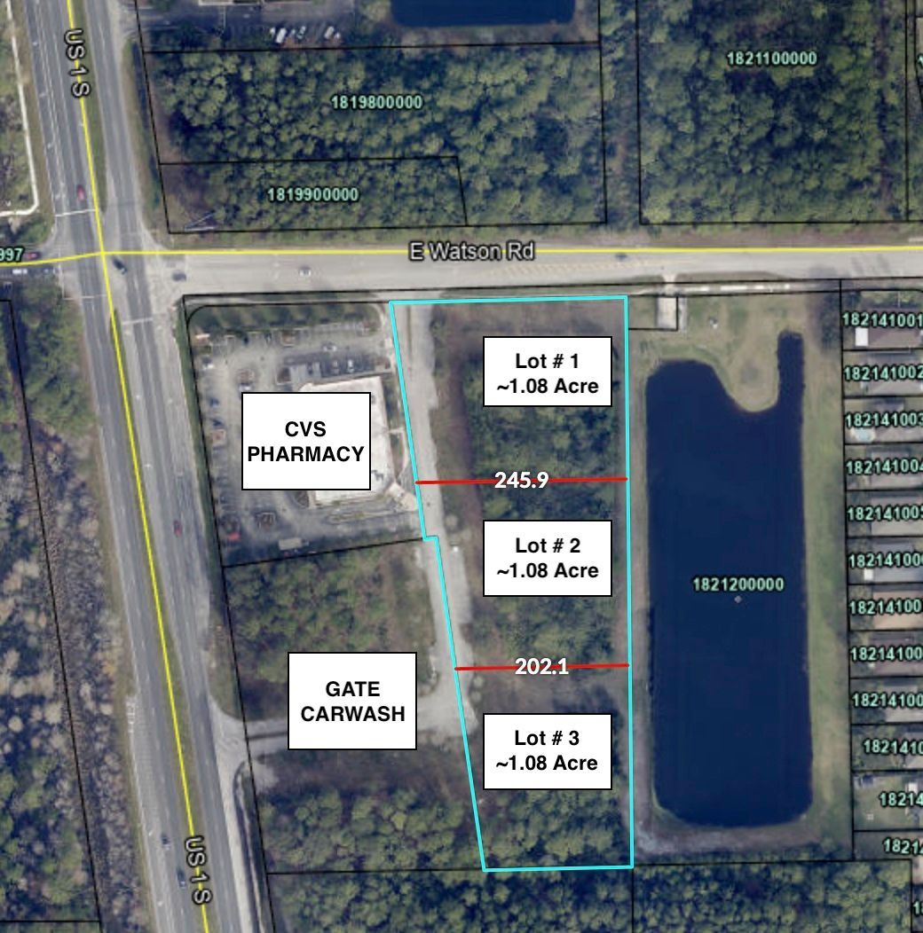 A large covered patio with furniture and a ceiling fan.