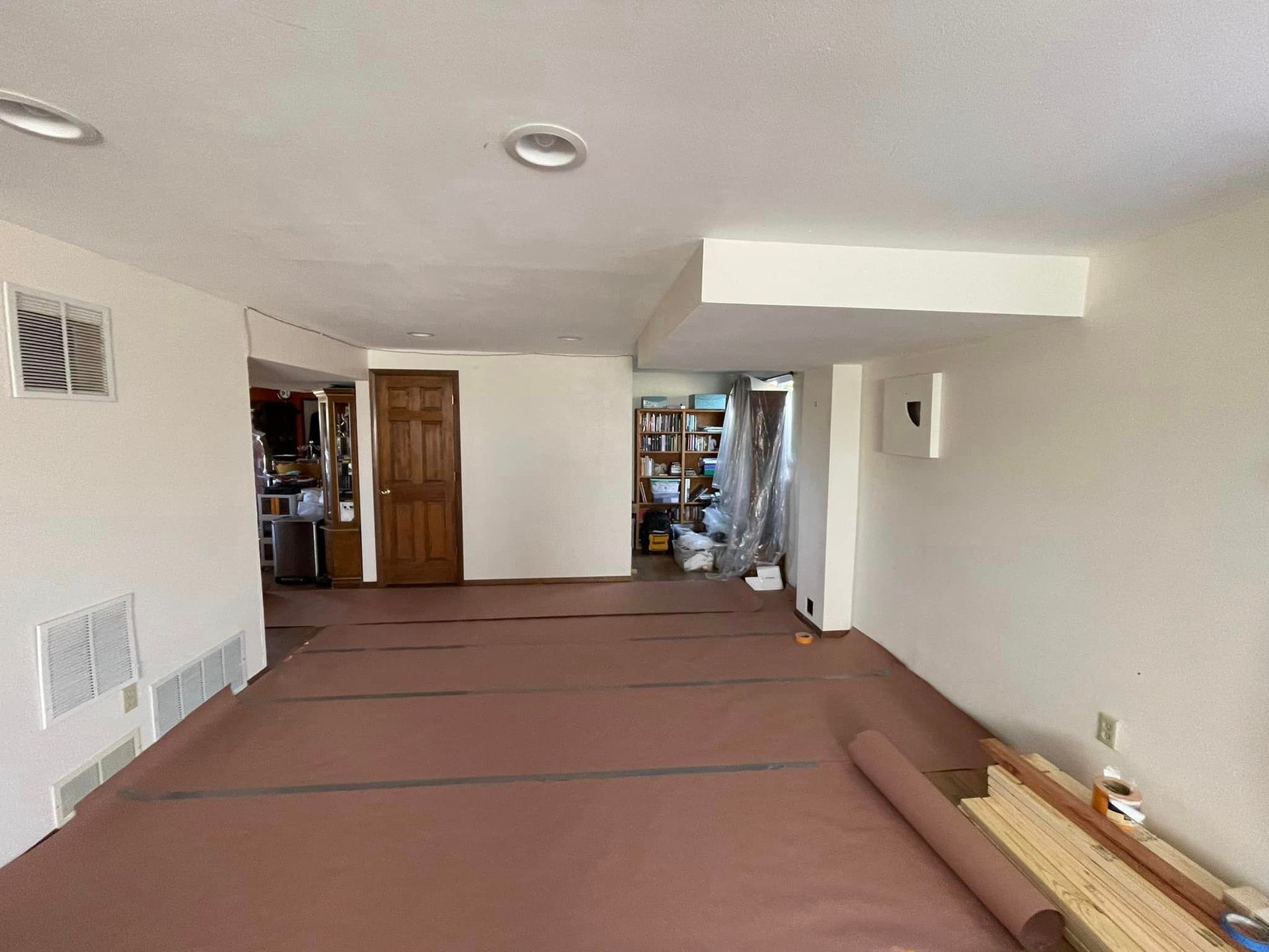 A large room with a lot of carpet on the floor.