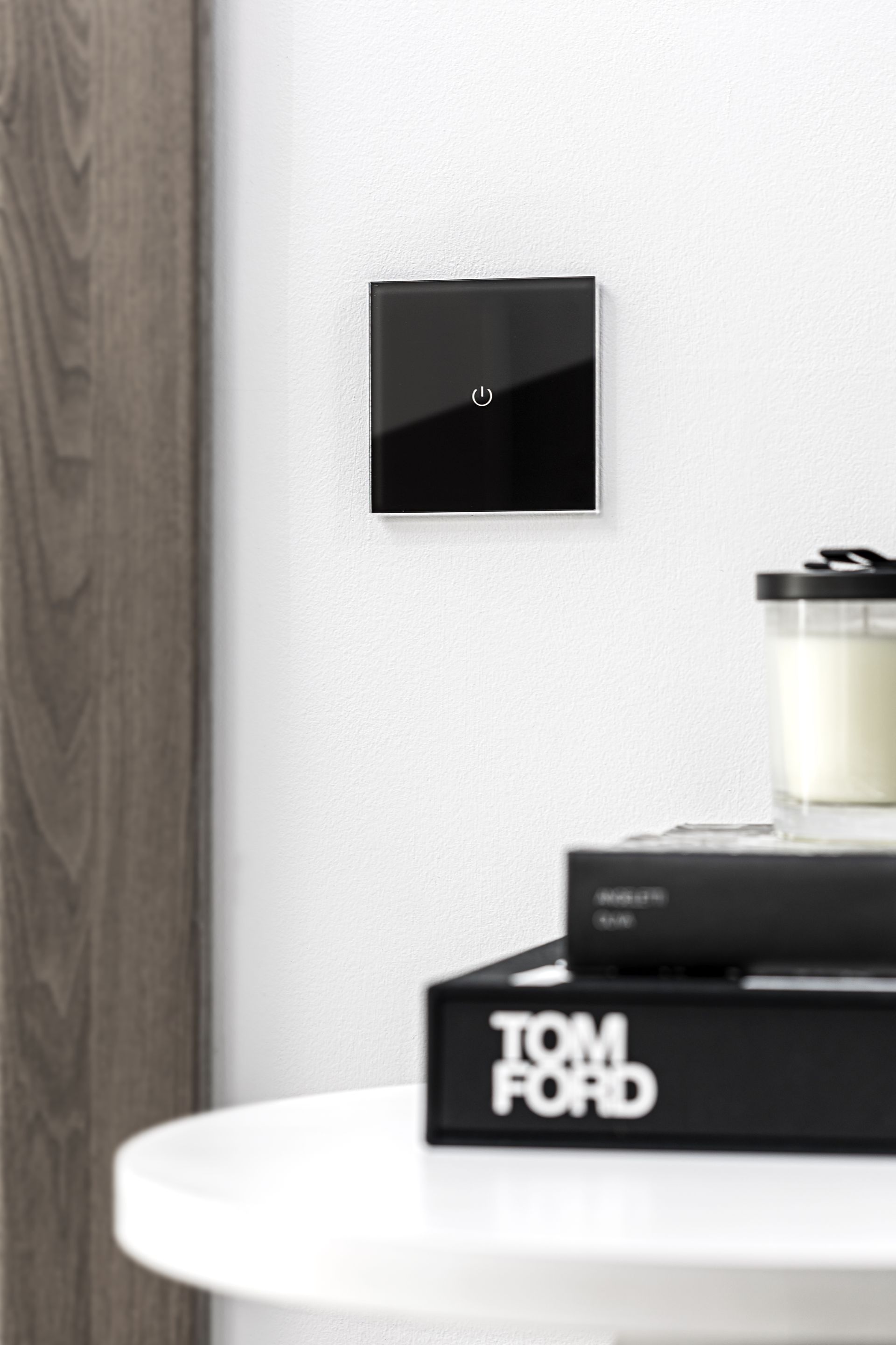 A table with a book titled tom ford on it