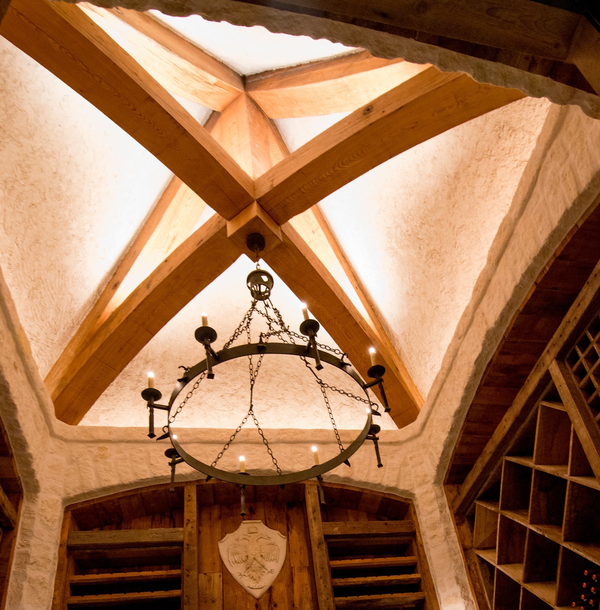 A chandelier is hanging from the ceiling of a building. Portfolio forPremier Lighting & Home Automation in Dallas Fort Worth (DFW).