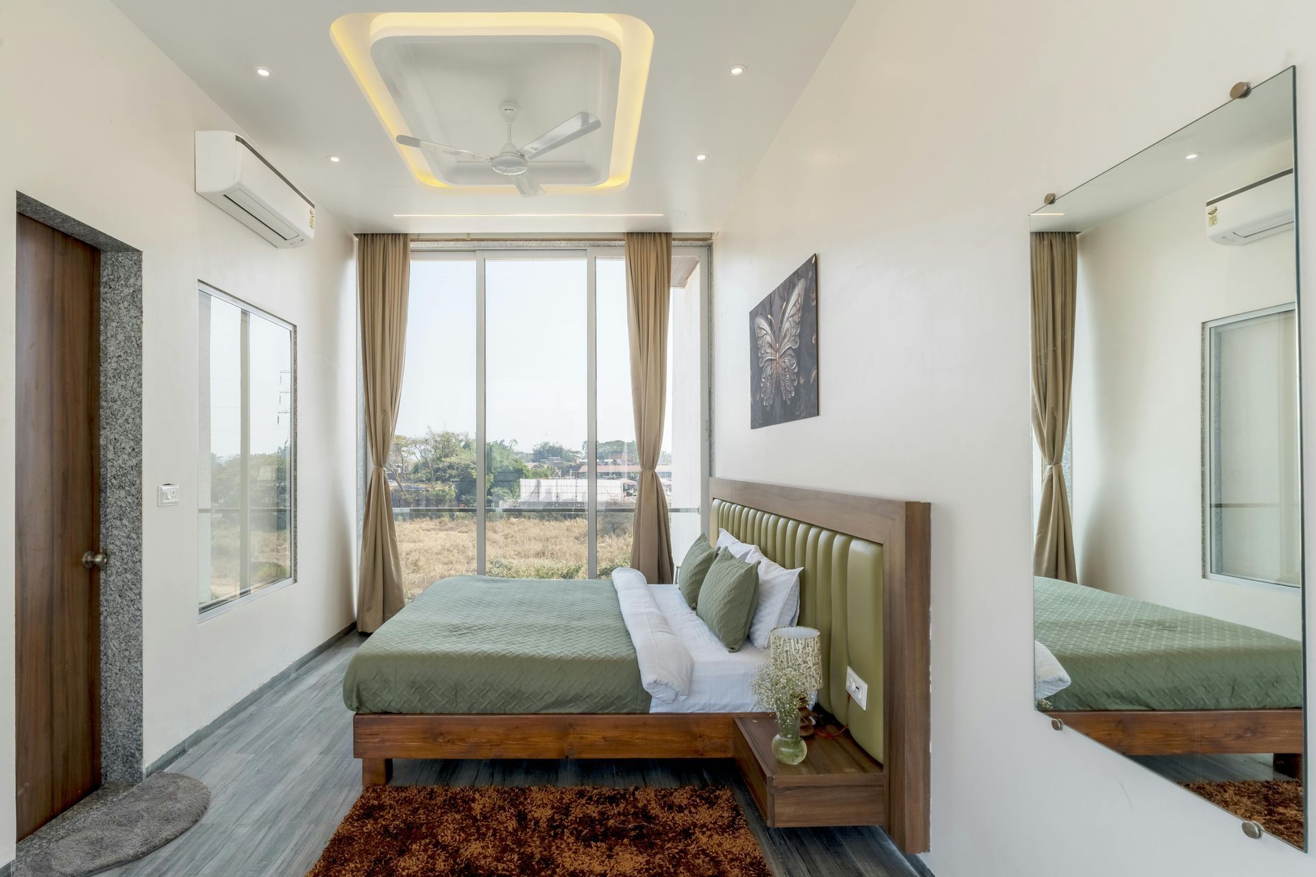 A living room filled with furniture and a couch. Portfolio for Premier Lighting & Home Automation home automation Dallas automation systems.