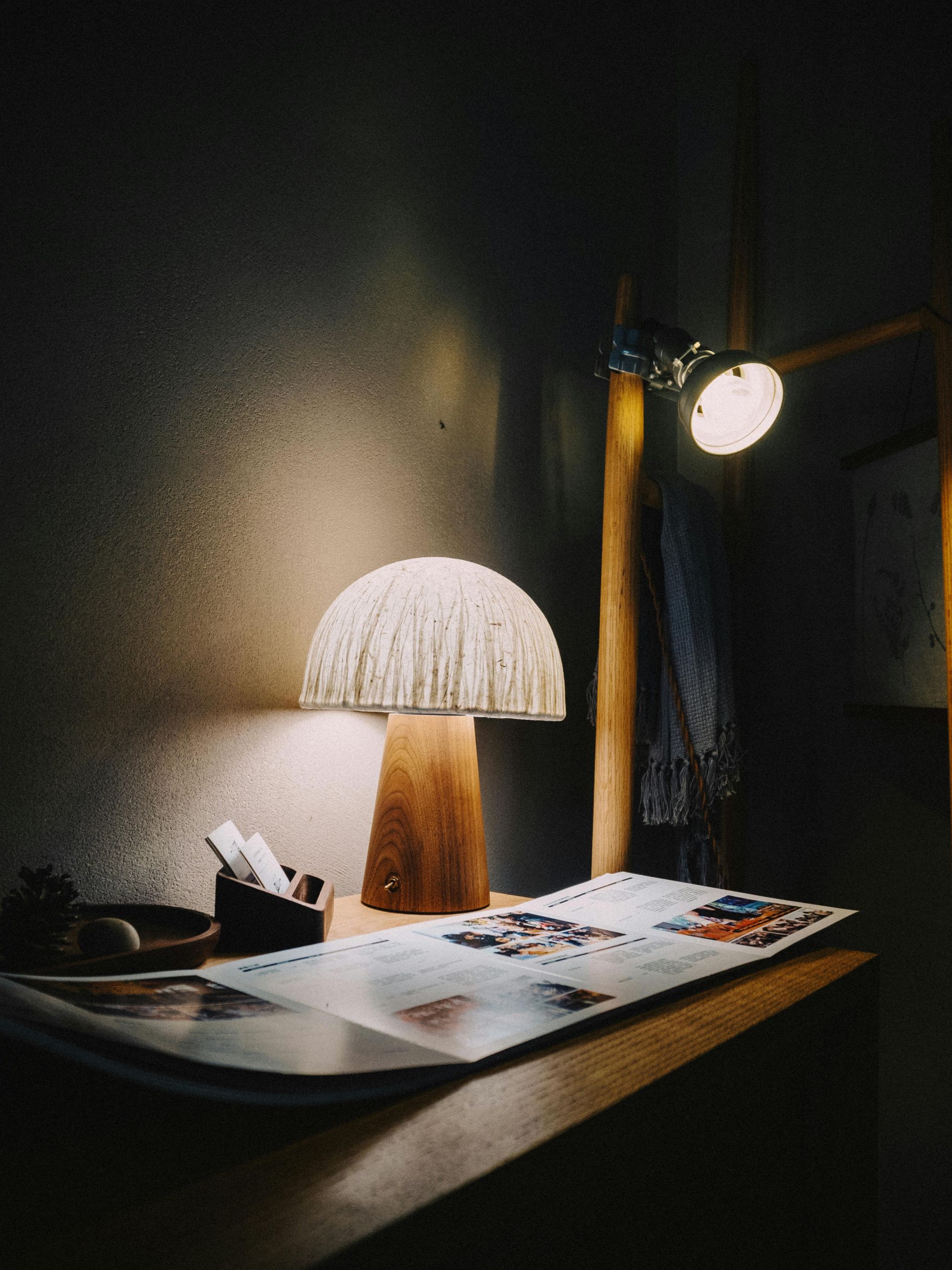 A man is using a tablet to control a thermostat. Portfolio for Premier Lighting & Home Automation home automation Dallas automation systems.