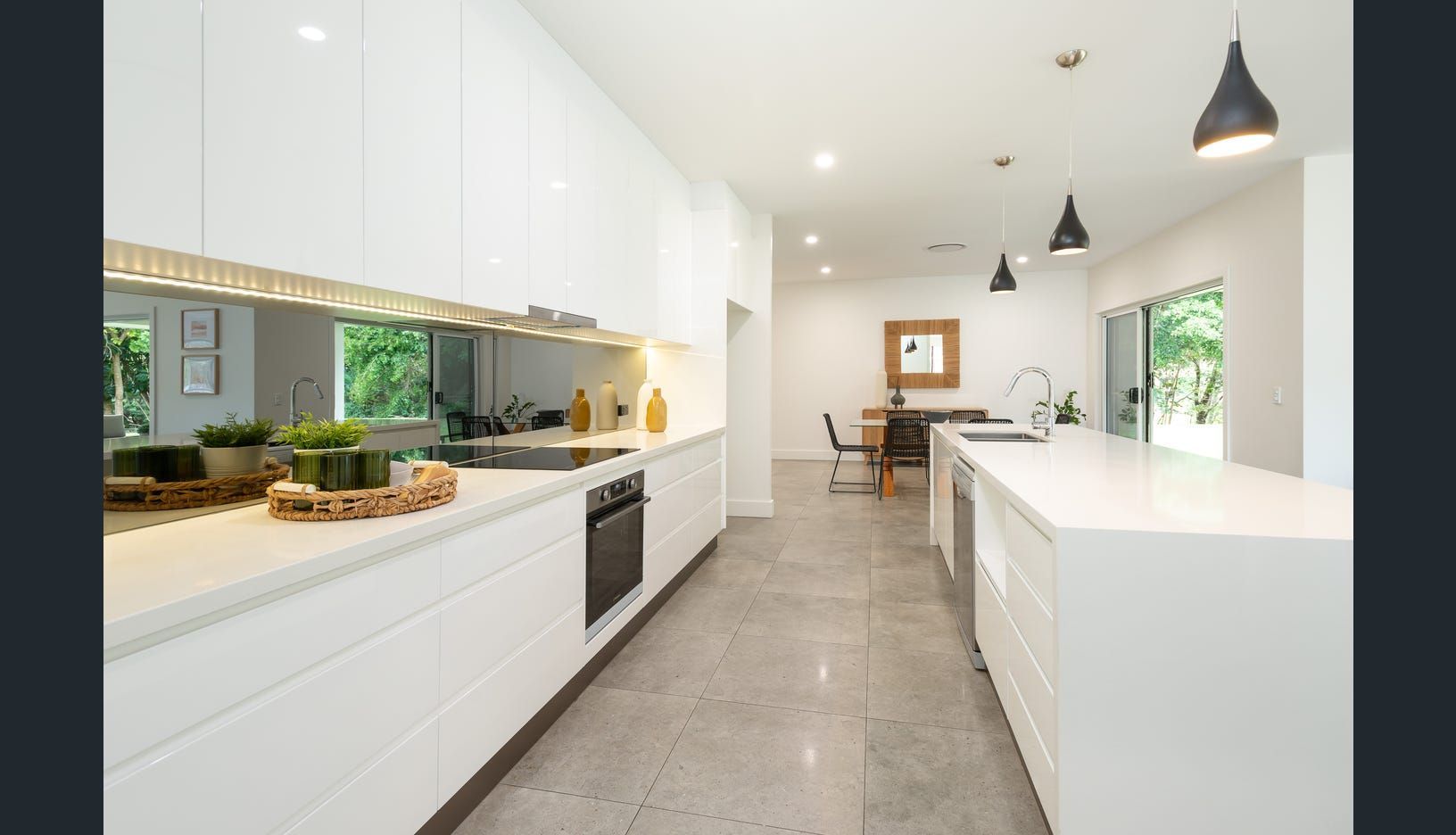 A Modern, Minimalist White Kitchen — Michael Duncan Constructions Pty Ltd in Mermaid Beach, QLD