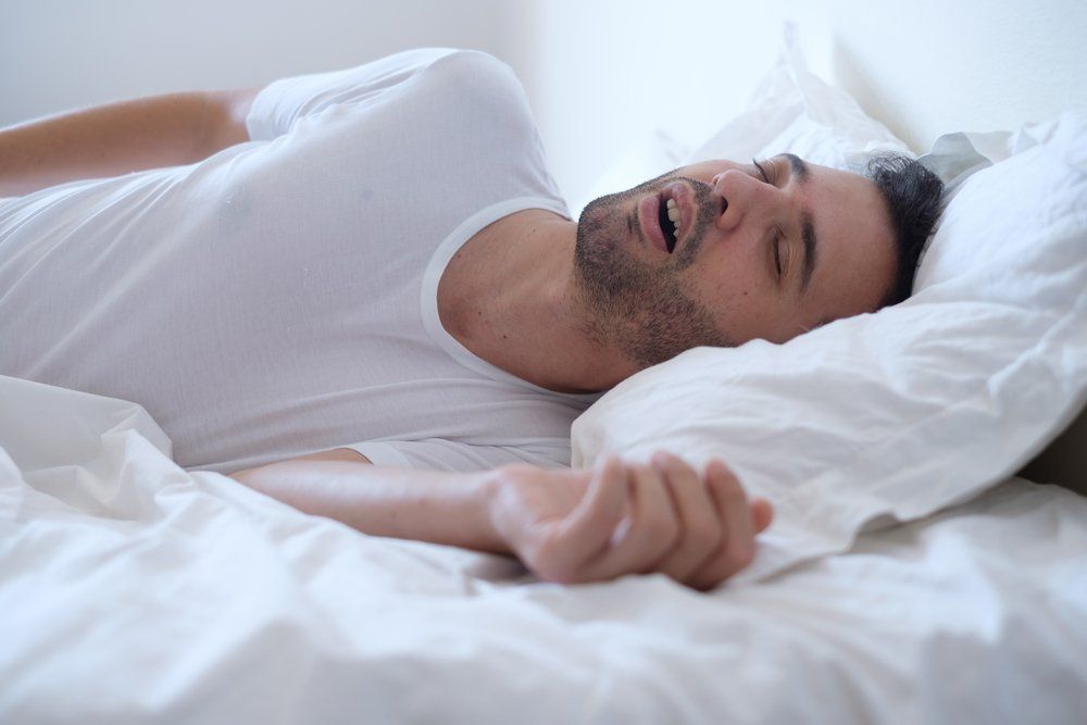 Man Sleeping In A White Shirt — JNT Dental — Richmond, VA