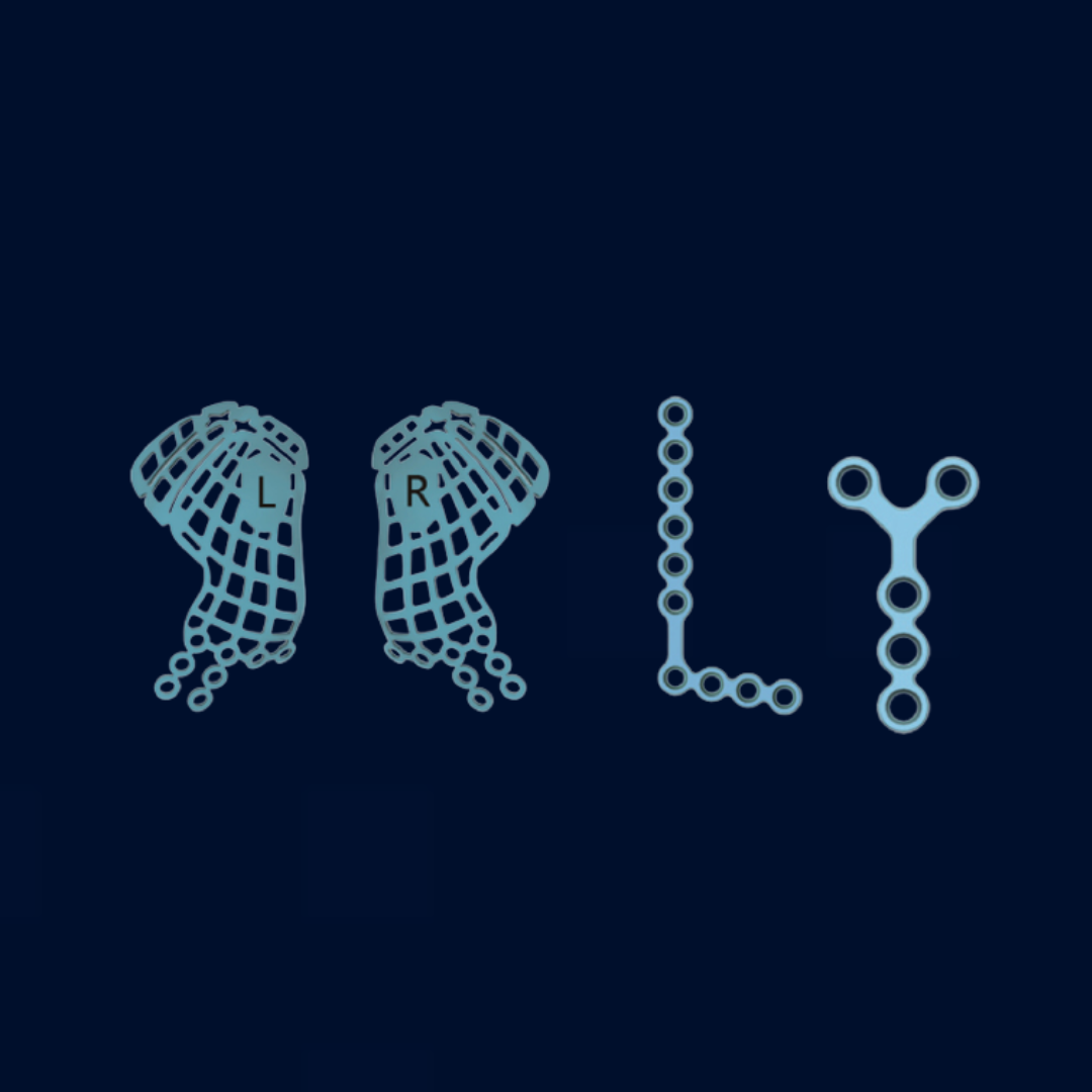 Cuatro tornillos de diferentes colores están alineados en fila sobre un fondo blanco.