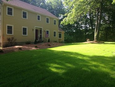 Retaining Walls - Grass Mowed In Front Of House in Shewsbury, MA