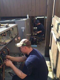 Two Repairmen — Commercial HVAC Contractors in Mount Vernon, OH