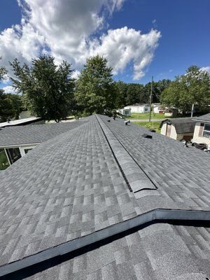 A Close Up Of A Roof With A Blue Sky And Clouds In The Background - Ravenna, Ohio - PRCA