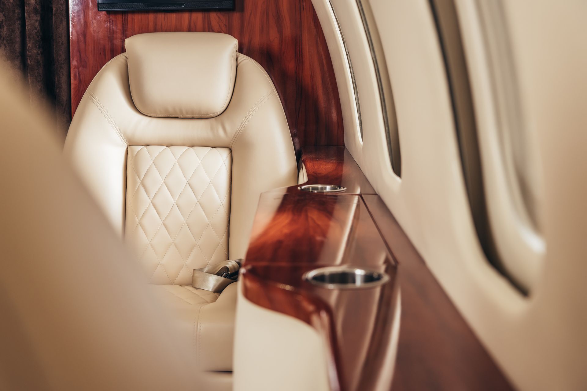 A close up of a seat in a private jet.