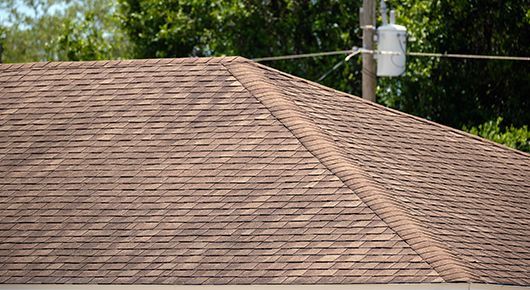 should I repair or replace my roof?