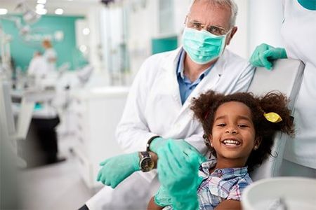 Dental Cleaning — Little Kid Smiling in North Canton, OH