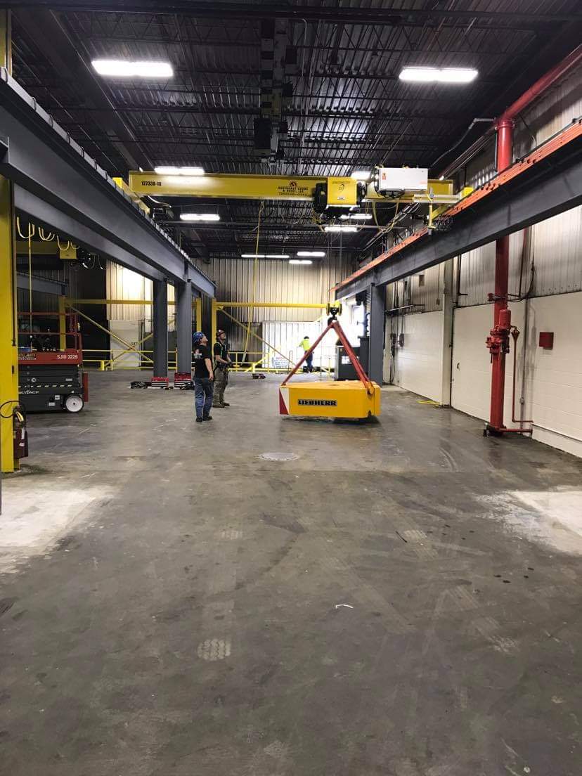 Workers Checking The Tower Crane — Pell City — Southeast Crane & Hoist