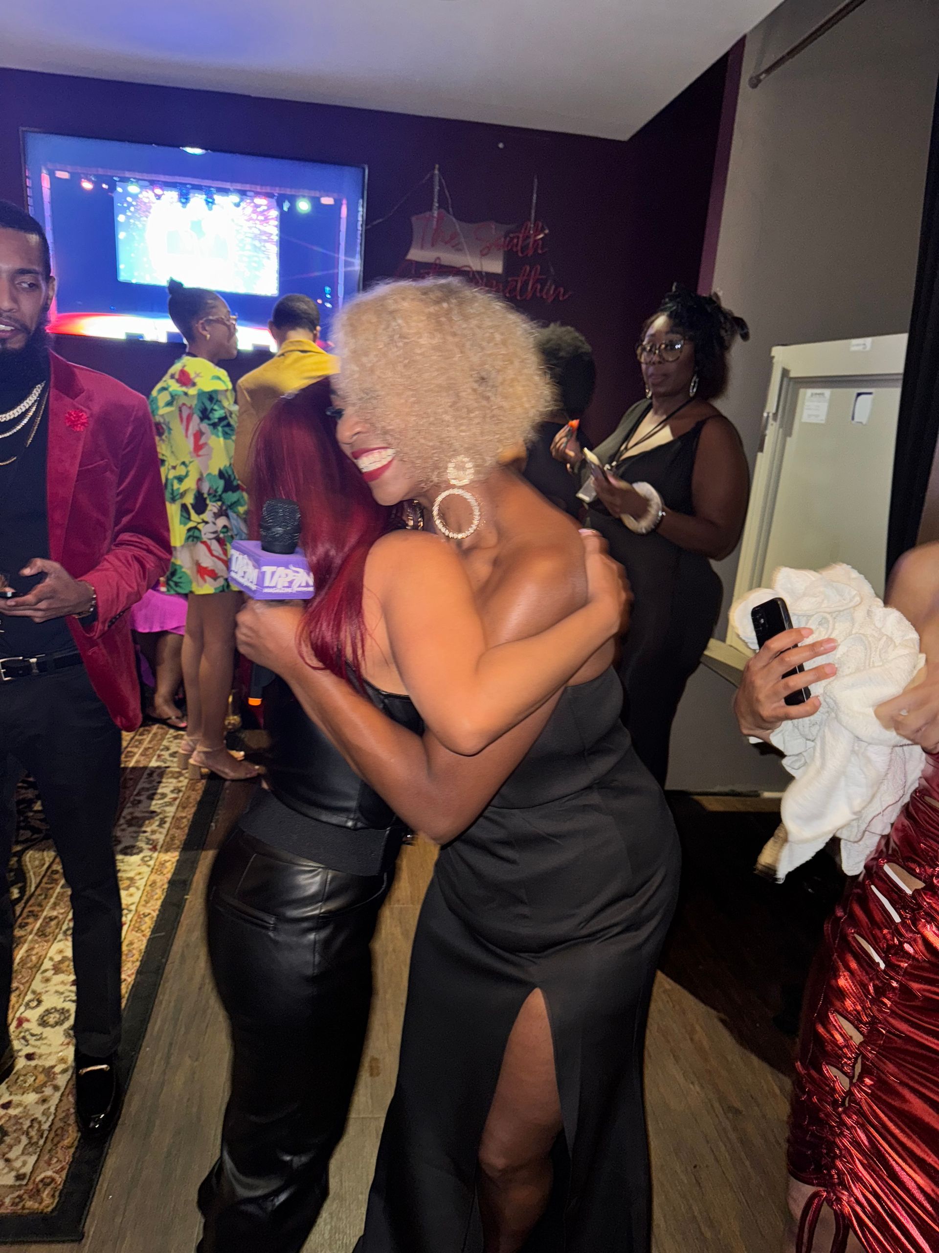 People Holding A Magazine — Oklahoma City, OK — Tap In Magazine