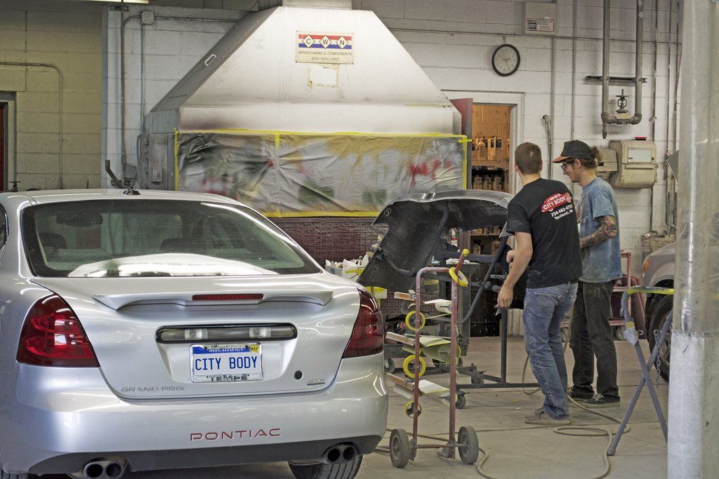 Staff Working on a Car — Ypsilanti, MI — City Body, Inc.