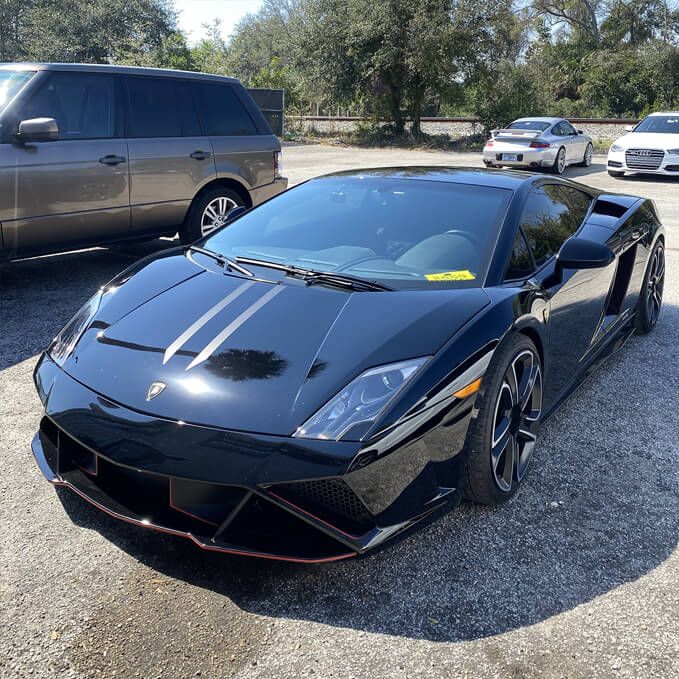 Black Lamborghini in Front of Velocity Motorwerks - St. Augustine European Auto Repair