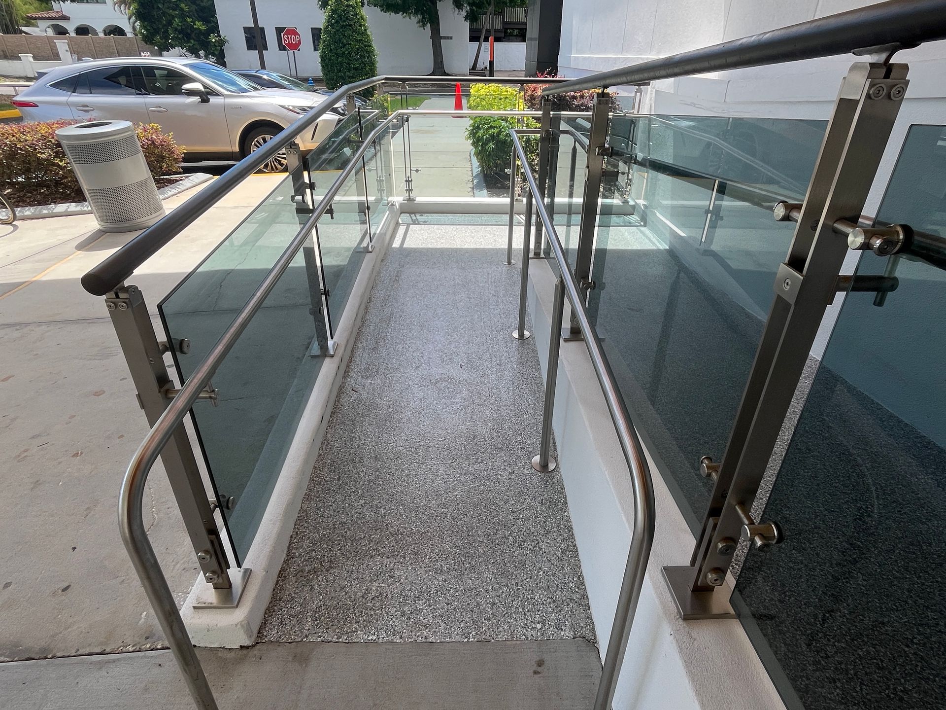 Ramp with railings provides wheelchair access to building in Winter Park, FL