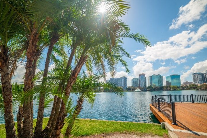 Orlando’s Lake Eola on a sunny day with cityscape views