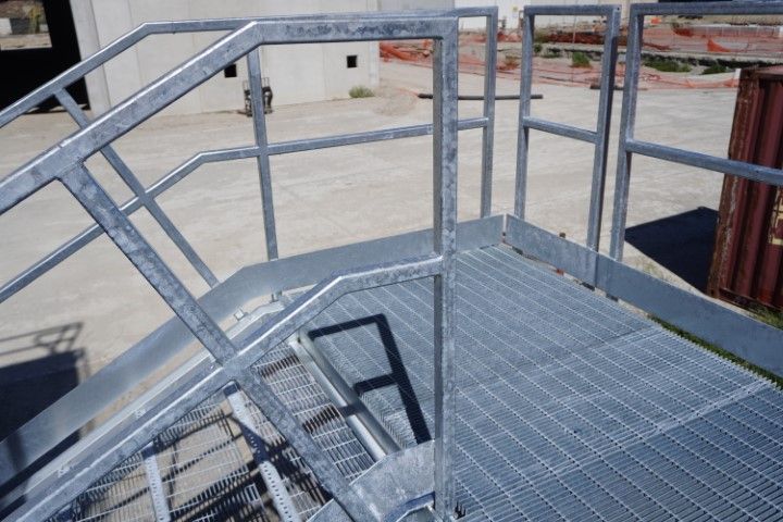 Industrial metal stairs with non-slip steel platform