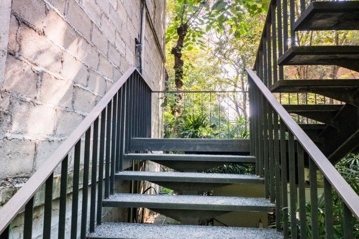 Modern stairway at concrete structure in Oak Ridge, FL