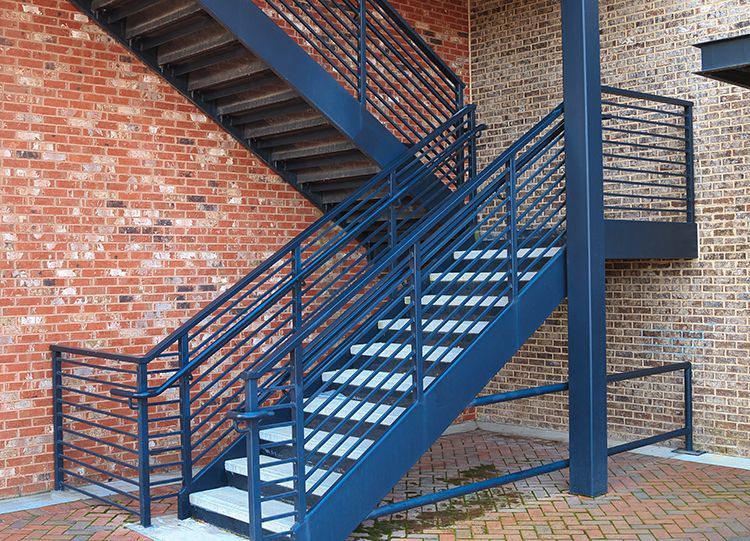 fire escape stairs with handrails on a new modern building