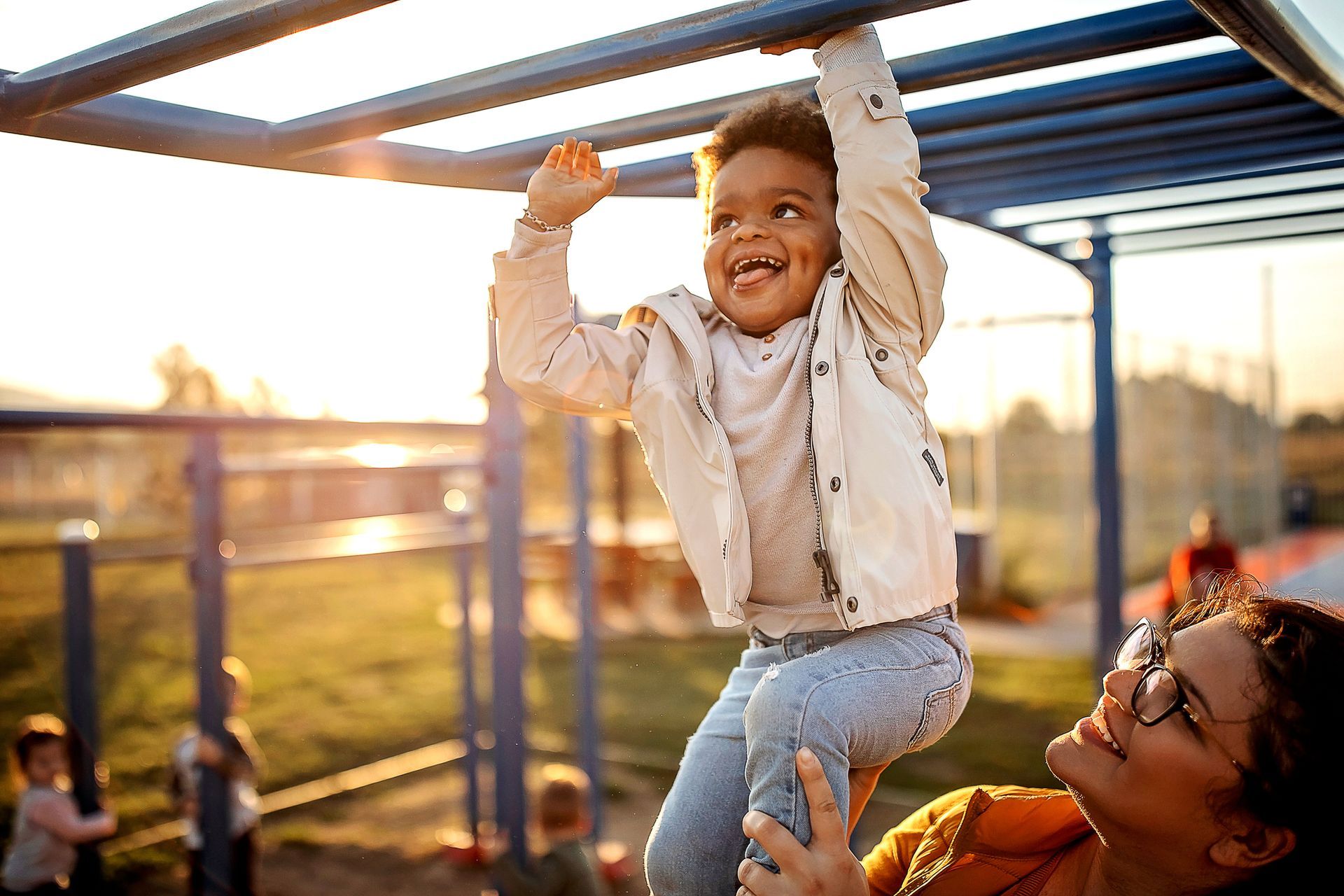 Child on monkey bars