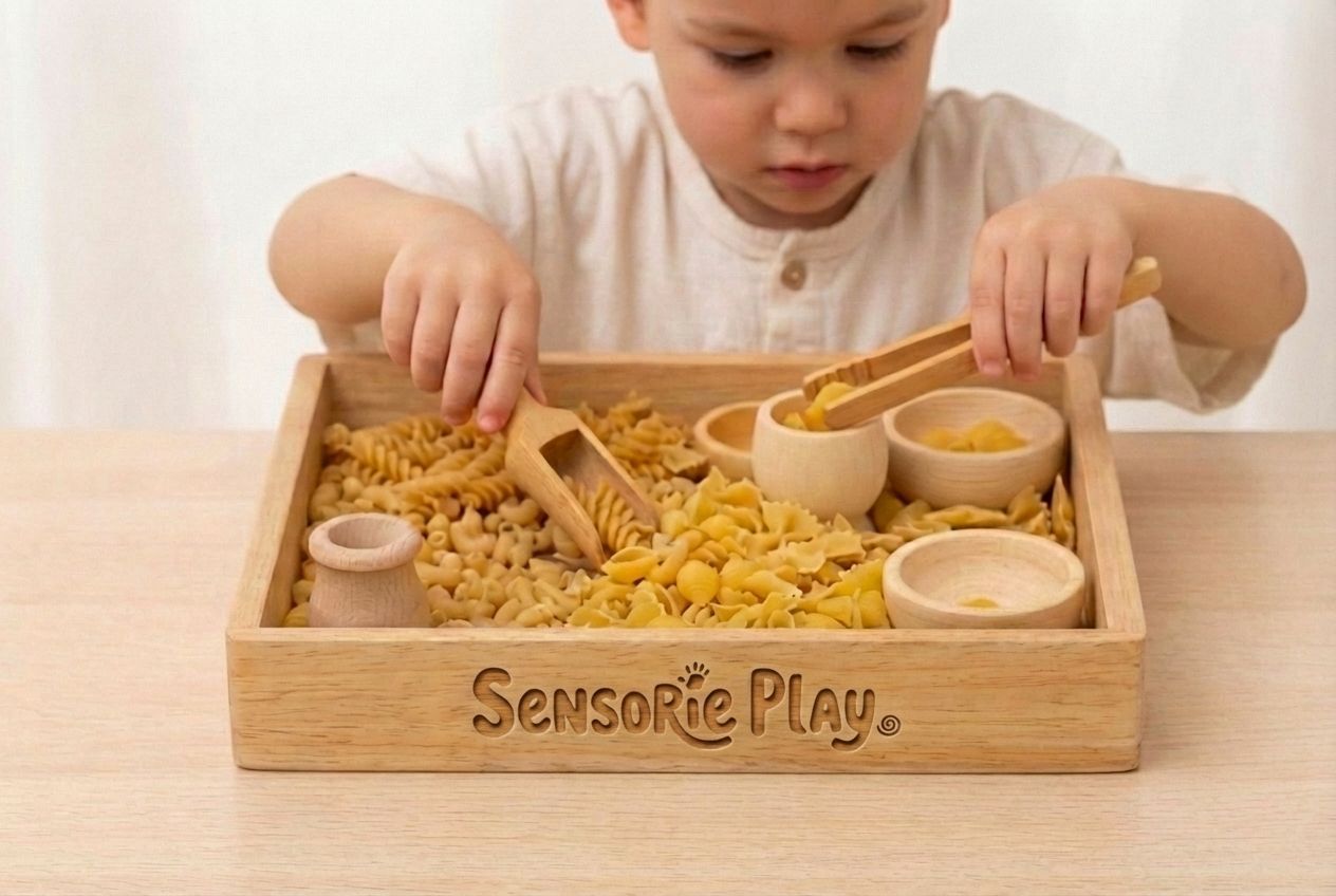 Sensory play kit with pasta materials and wooden tools for scooping and fine motor skills