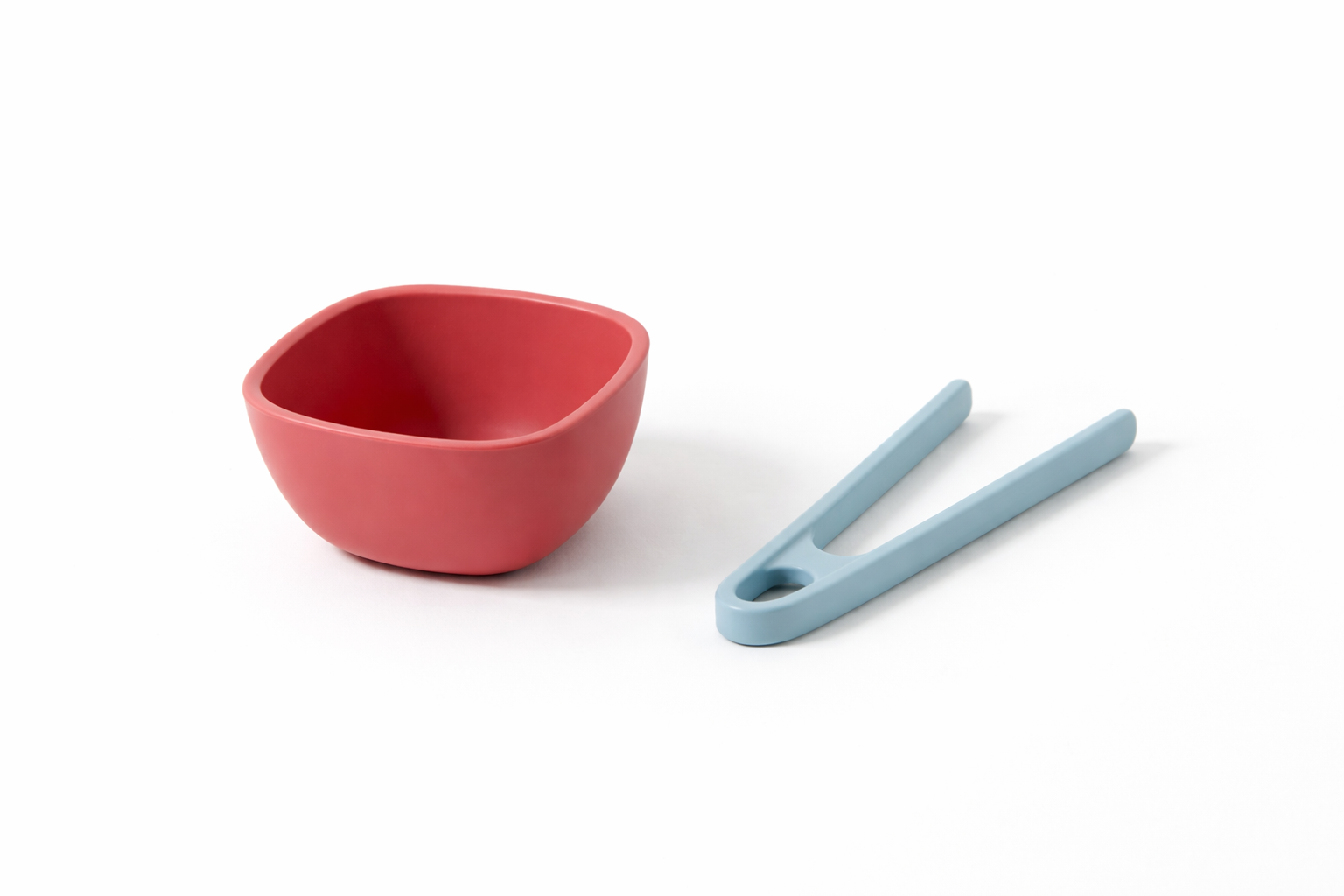Sensorie Silicone Play Tools, a calm dusty blue bowl and coordinating tongs set, designed for mess-free and engaging sensory play.