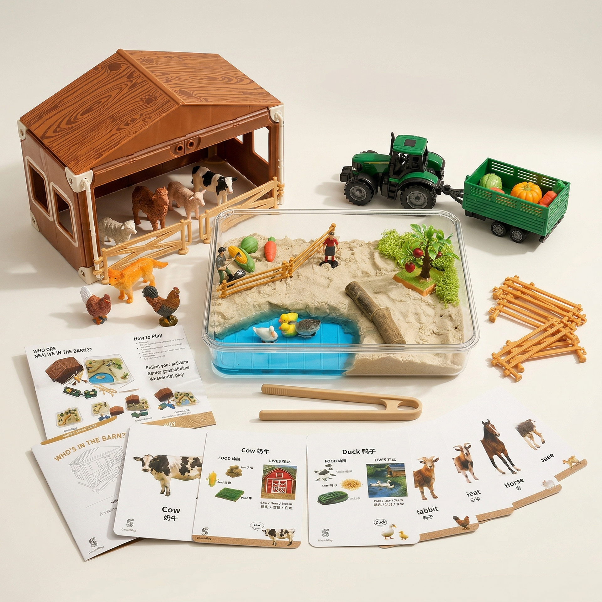 A toy farm set featuring a barn, a green tractor with a produce trailer, a sensory bin with sand and water, and info cards.