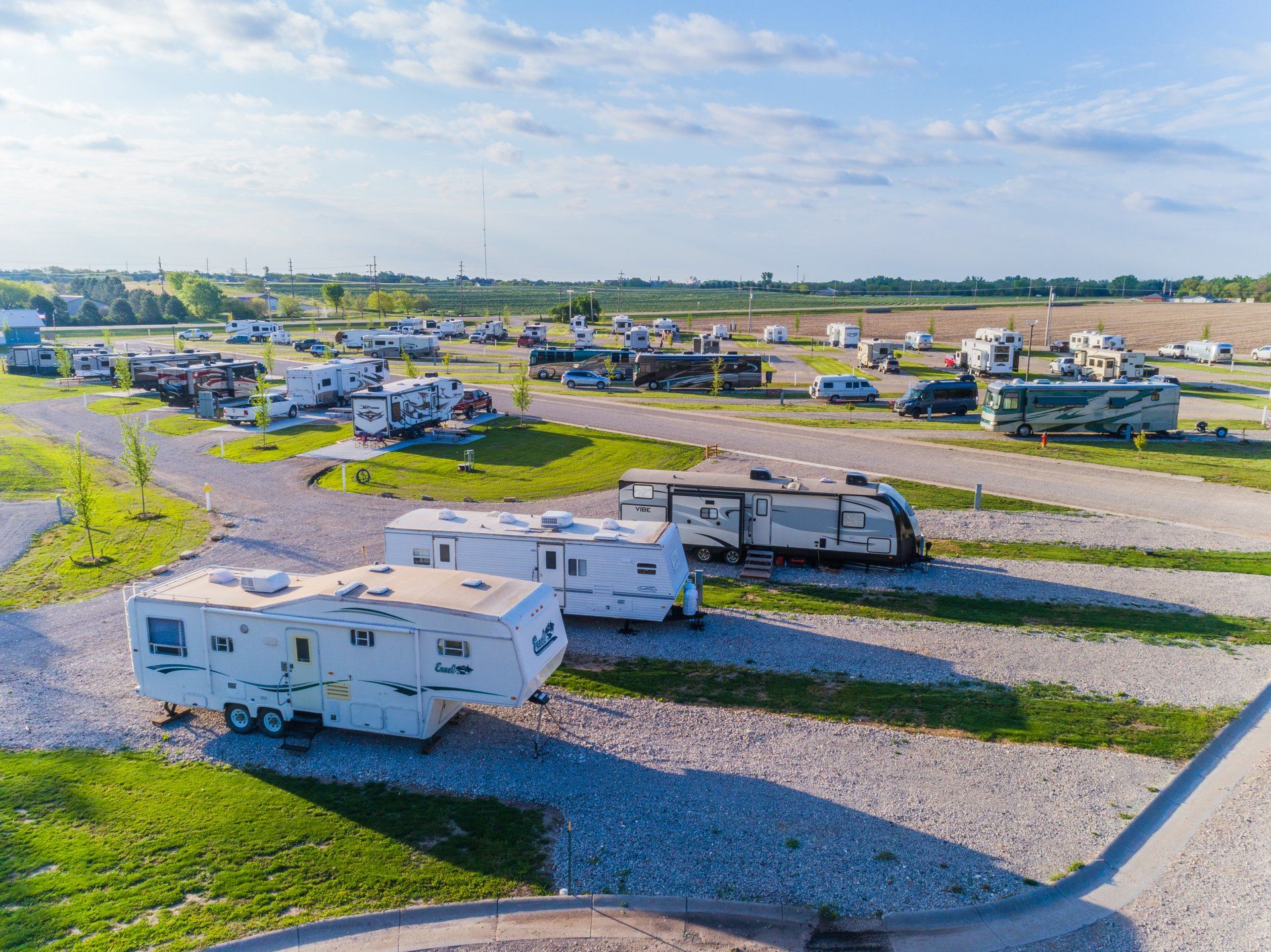 Aerial view of campers and RVs parked at Creek Side Resort in Hays, KS