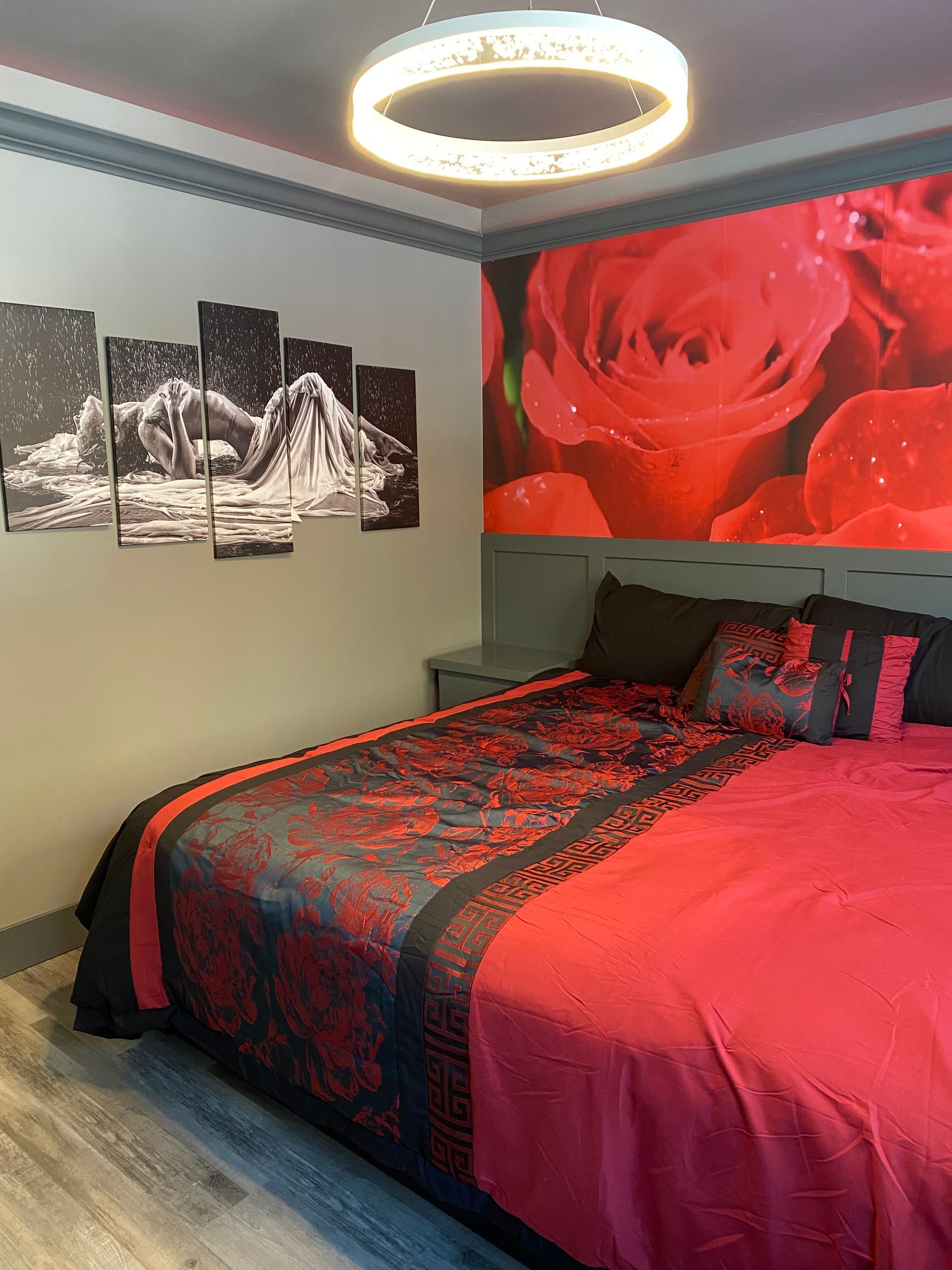 King Bed and Adult Artwork in Cabin 8. 