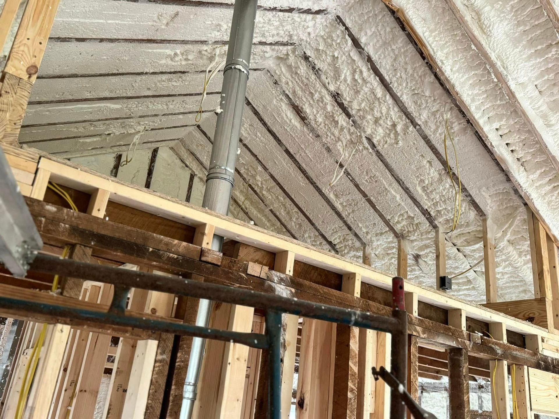 A house is being built and the ceiling is covered in foam.