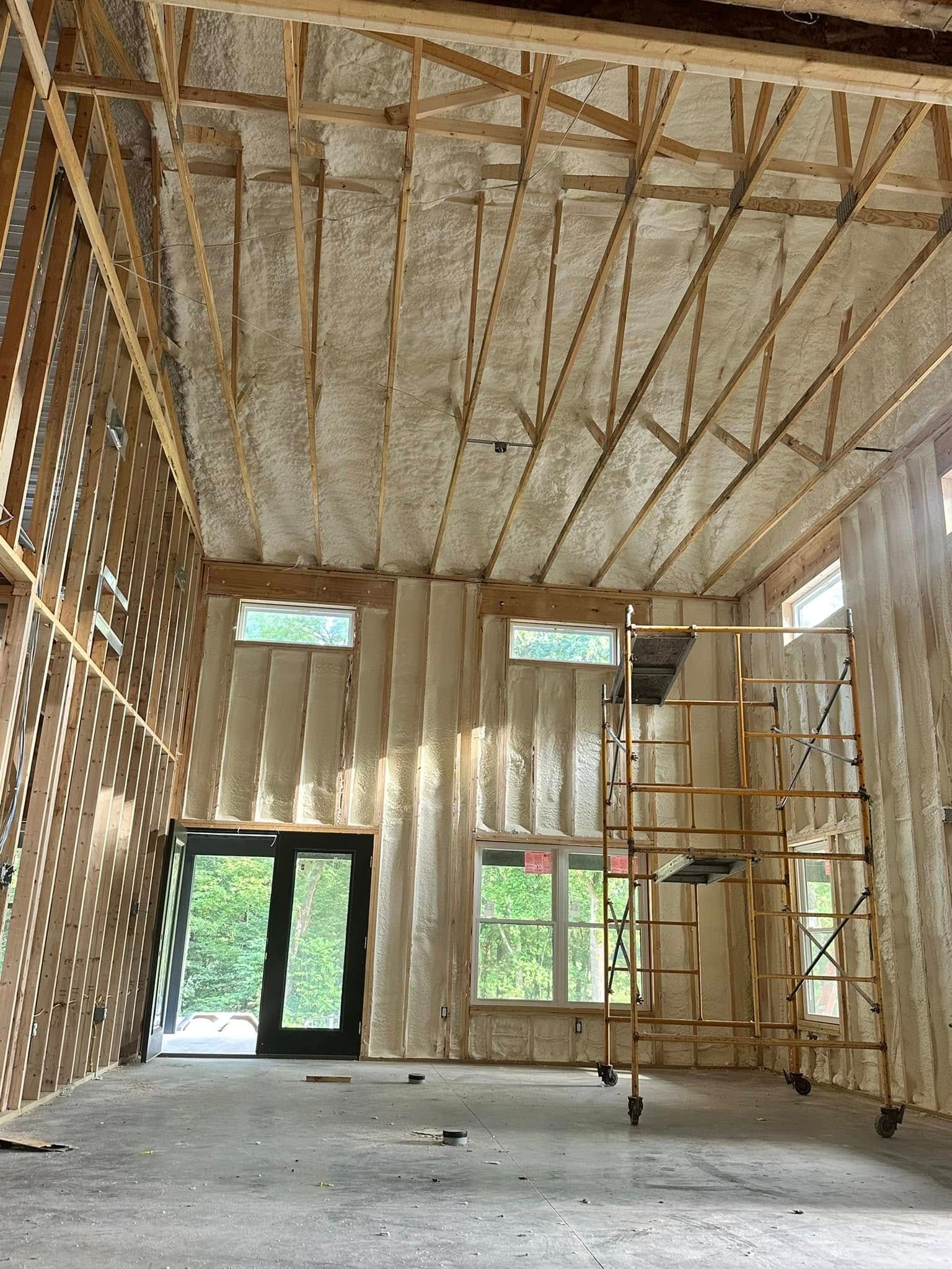 A large room with a lot of insulation on the walls and ceiling.