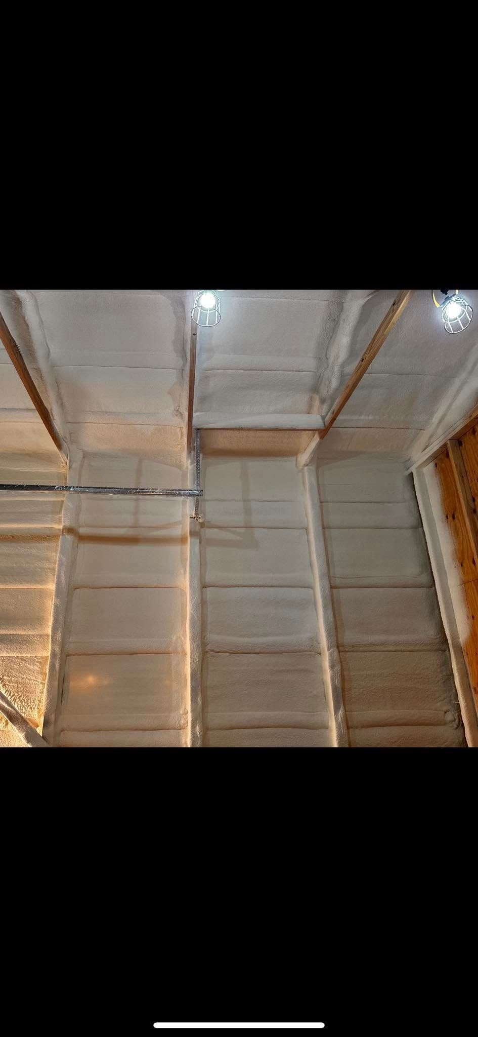 A picture of the ceiling of a wooden building.