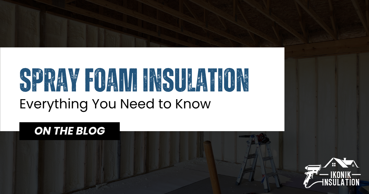 Technician applying spray foam insulation to attic beams at a residential home