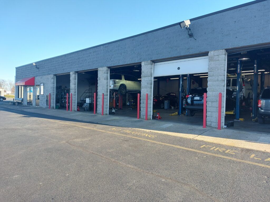 A car is being worked on in a garage