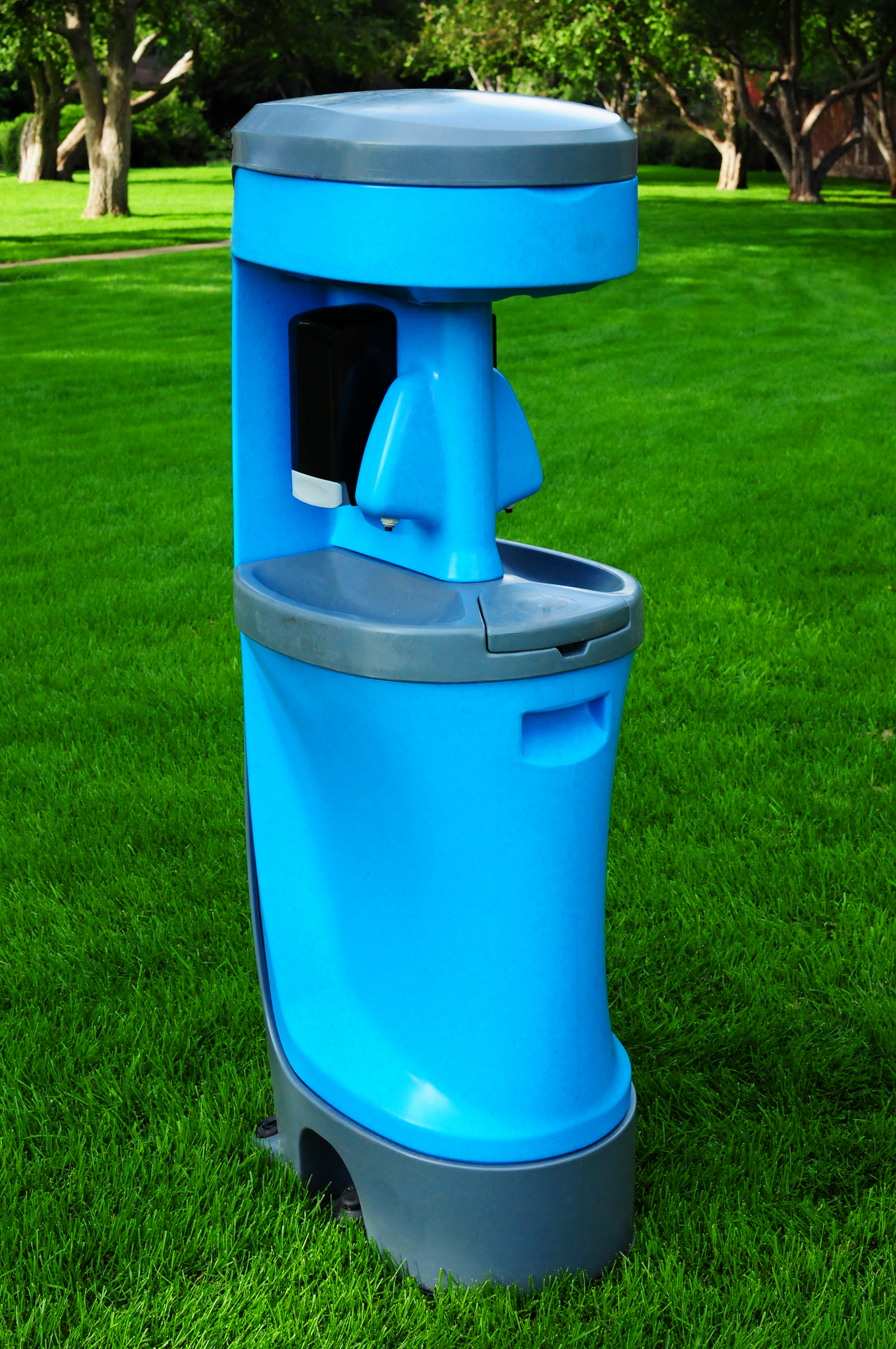 Hand wash station breeze in green grass | Flagstaff, AZ | First Class Sanitation