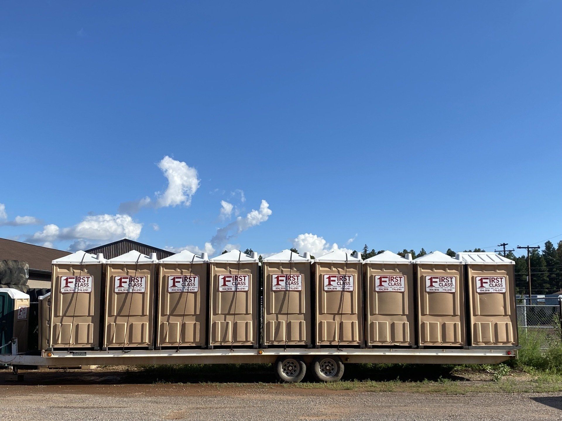 Portable restrooms in a truck | Flagstaff, AZ | First Class Sanitation